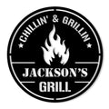 Round BBQ metal sign with a central flame graphic, bold grill design, and custom family-style artwork