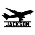 Black airplane silhouette metal sign with bold pilot-inspired aircraft artwork and a framed lower design