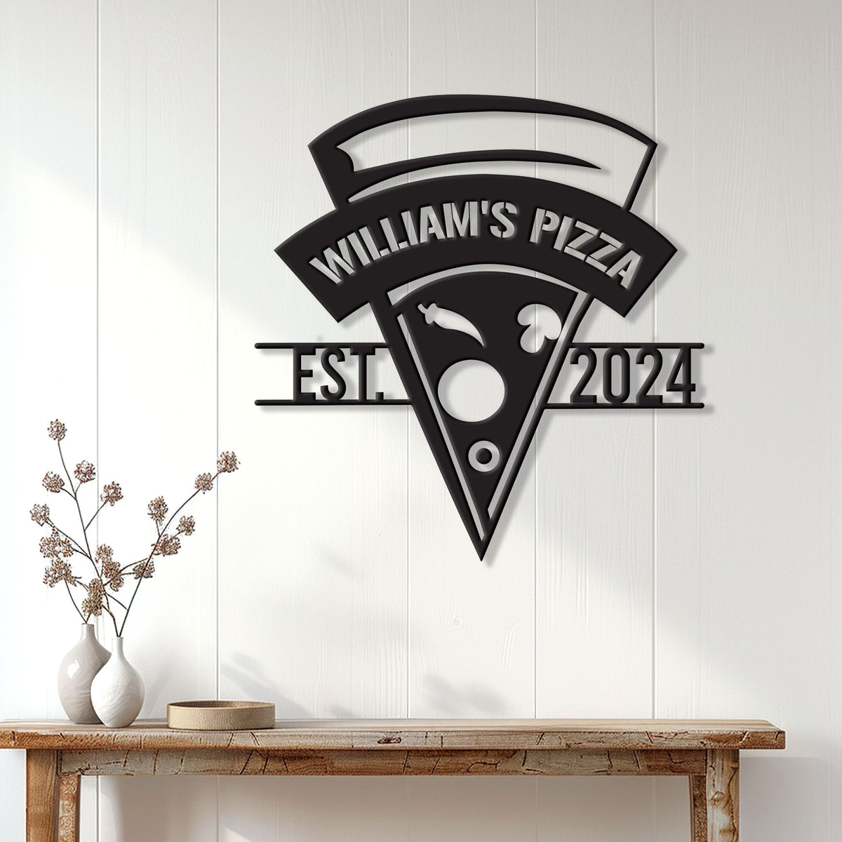 Pizza metal sign displayed on a white paneled wall above a rustic entryway table