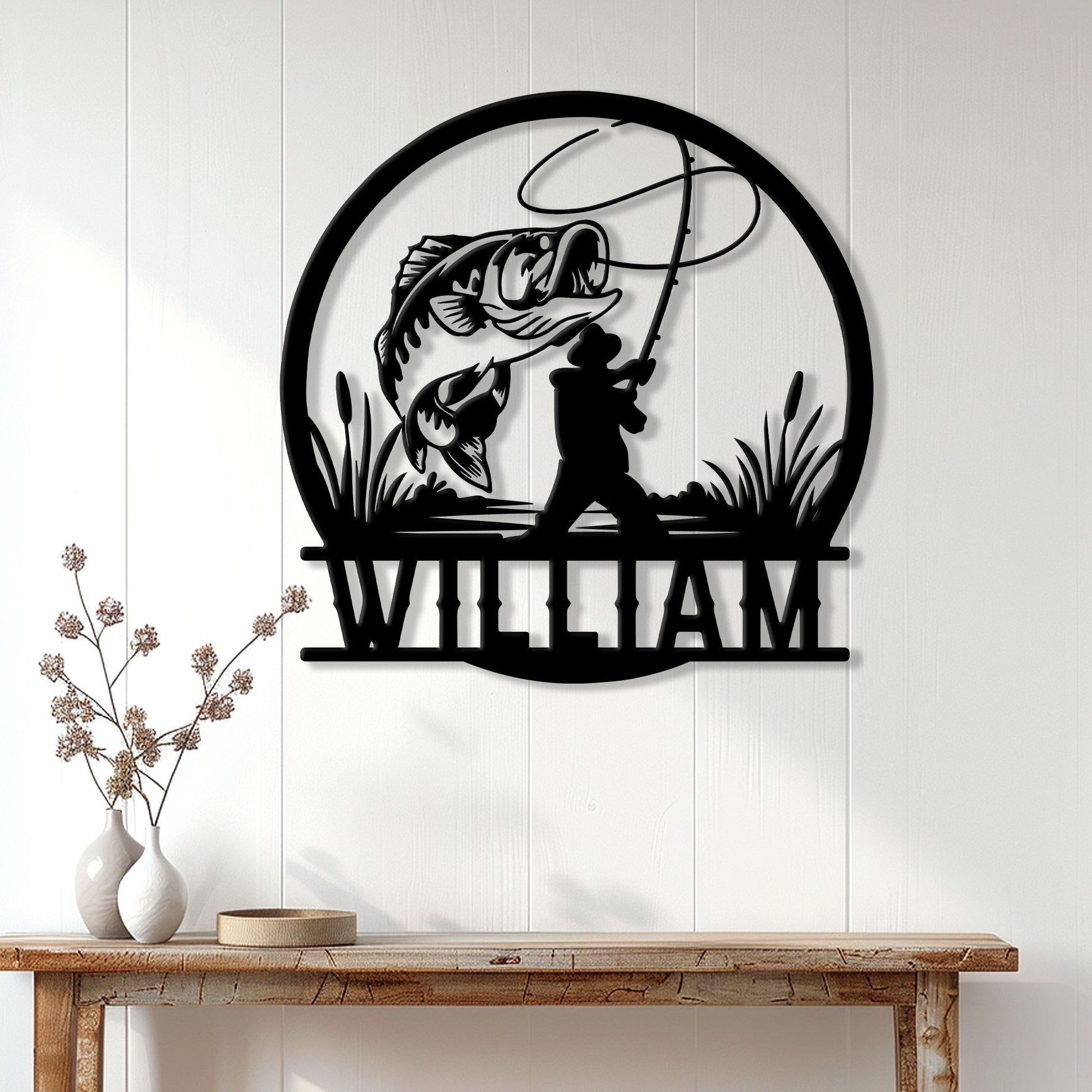 Bass fishing wall sign displayed on a white paneled wall above a rustic console table