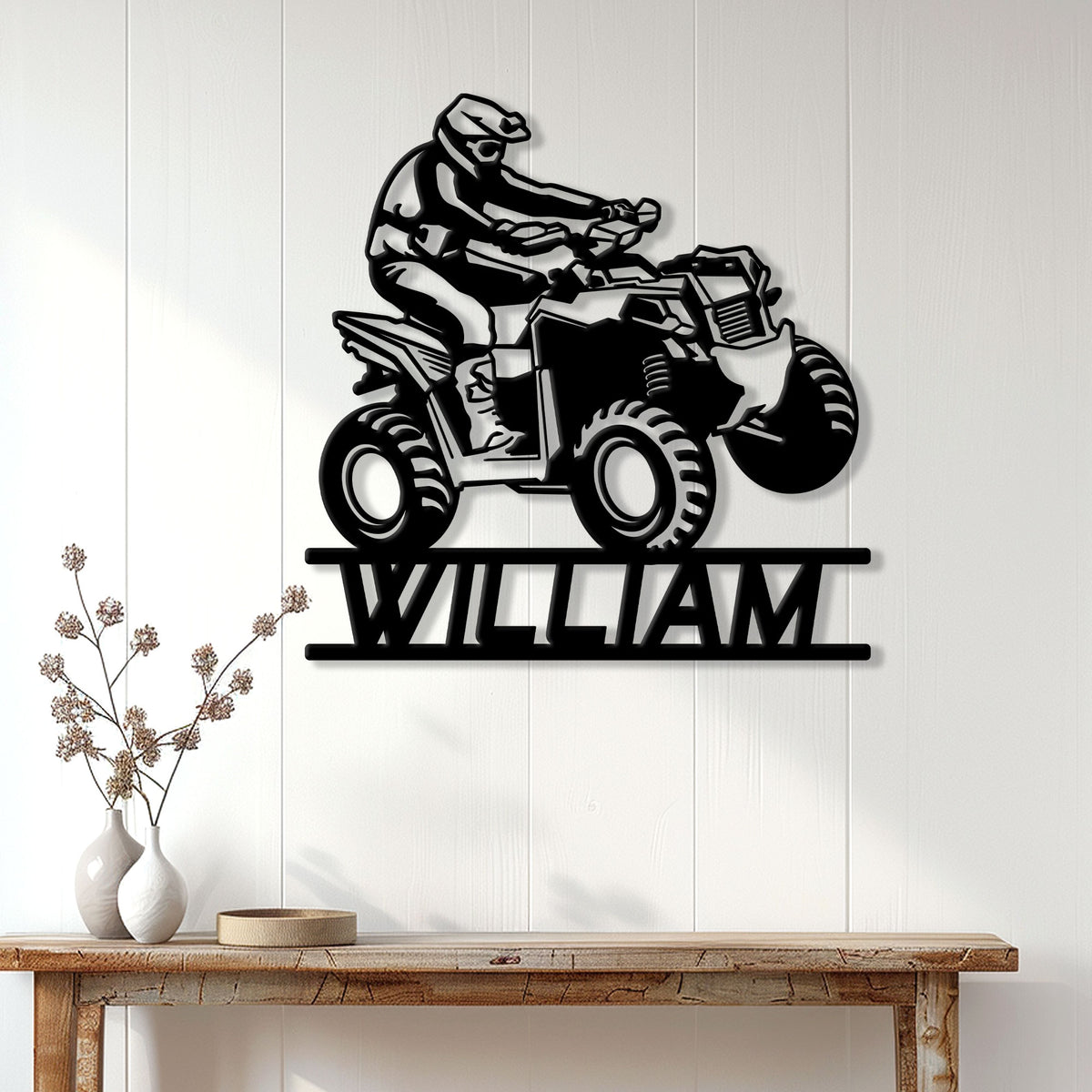 ATV metal sign displayed on a bright paneled wall above a wooden console