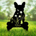 French Bulldog memorial metal sign with a floral silhouette and butterfly details displayed in a garden