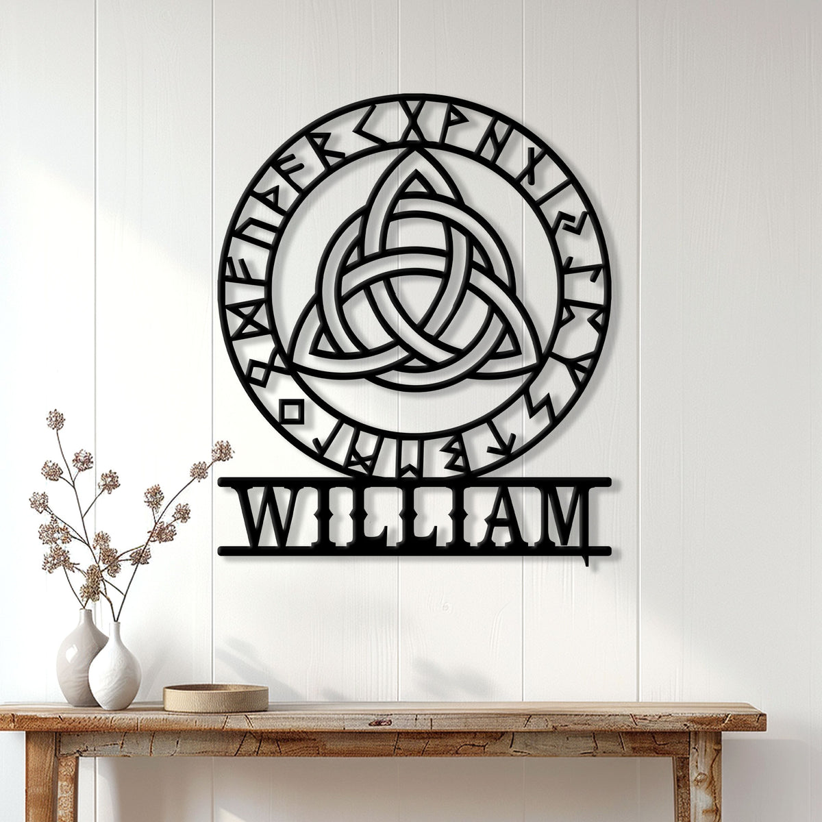 Norse-inspired Viking metal sign displayed on a light wood wall above a console table