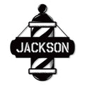 Black barber pole metal sign with bold cutout lettering and classic striped pole design
