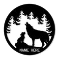 Round wolf metal sign with a howling adult wolf and pup silhouetted among evergreen trees