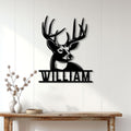 Custom whitetail buck metal sign displayed on a white paneled wall above a rustic console table