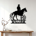 Western cowboy riding horse metal sign displayed on a white paneled wall above a rustic console table