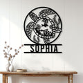 Sea turtle metal wall decor displayed on a light wood-paneled wall above a console table