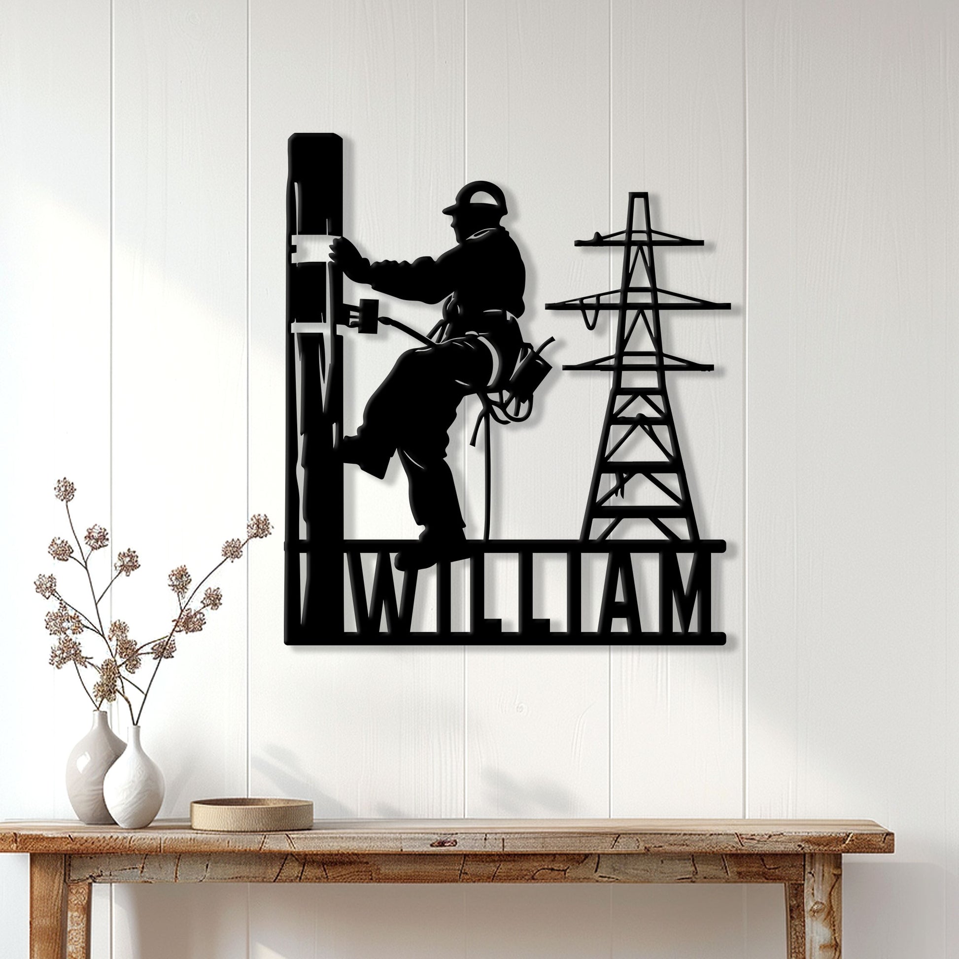 Lineman wall decor displayed on a white paneled wall above a console table in a bright home interior