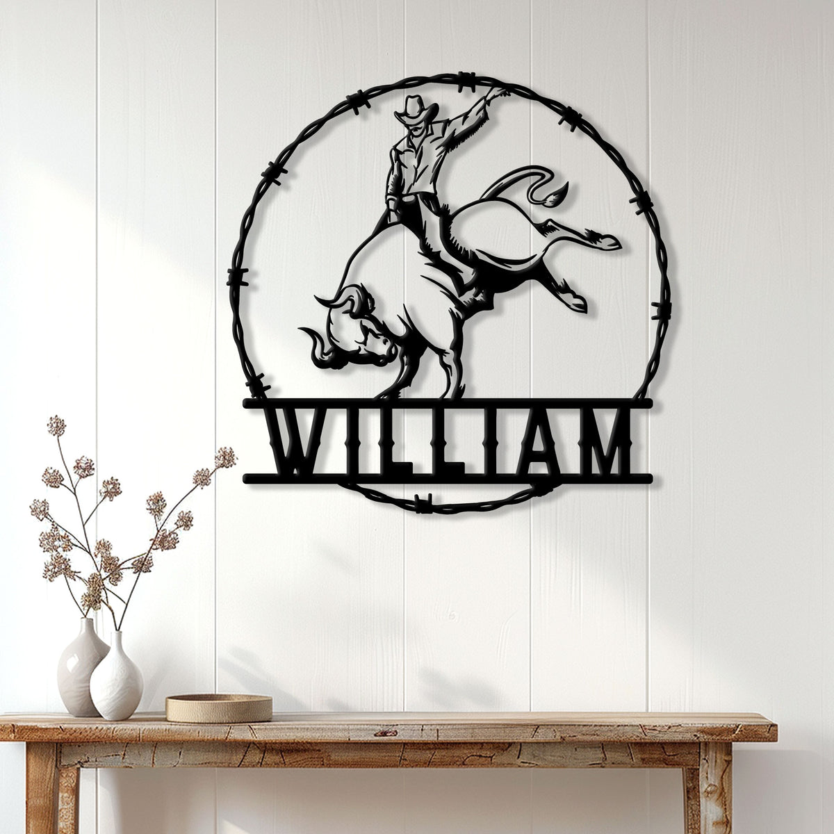 Rodeo cowboy and bucking bull metal sign displayed as western wall decor in a home entryway