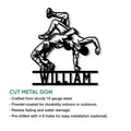 Wrestling cut metal sign featuring a dynamic grappling silhouette for wall display