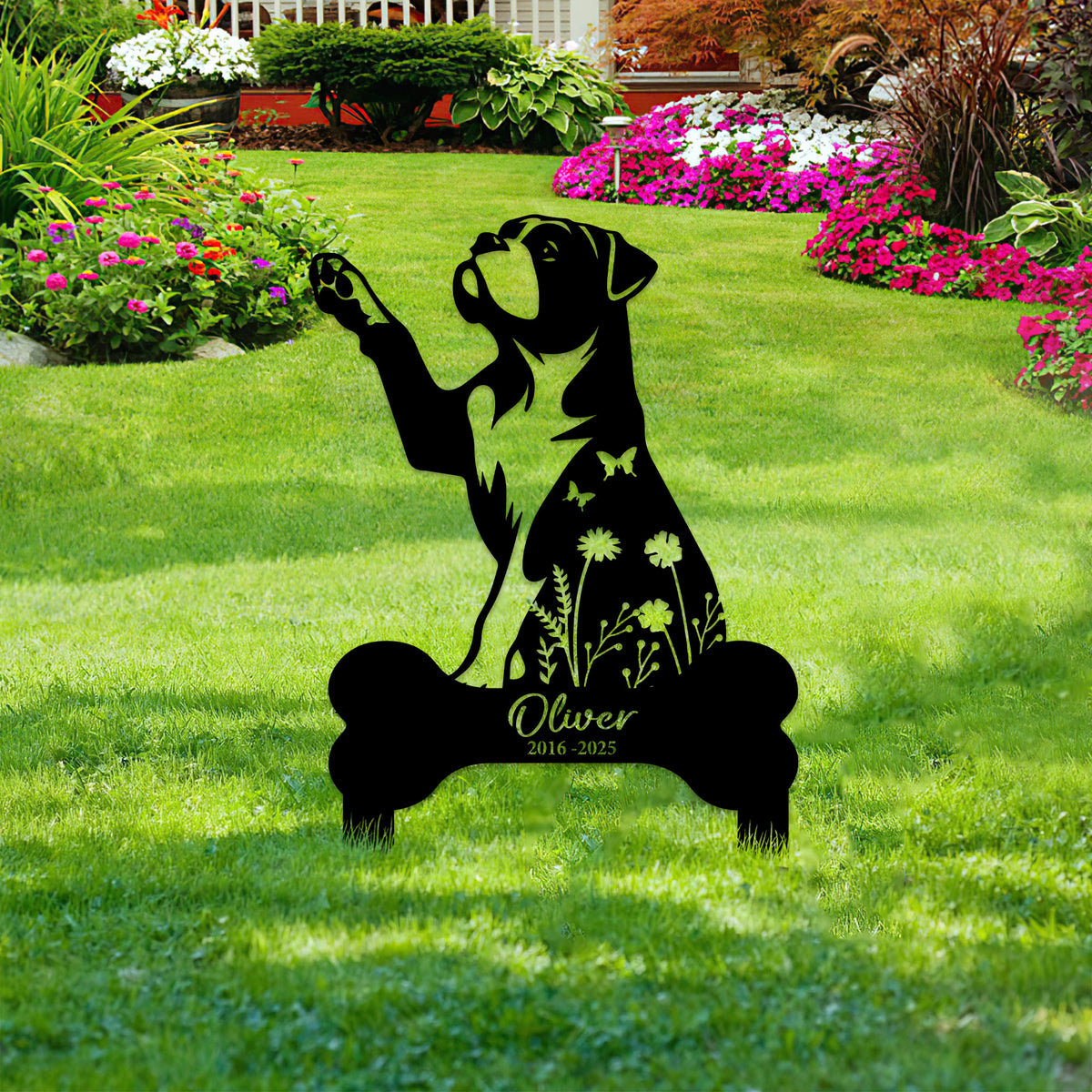 American Bulldog memorial sign displayed in a flower garden, featuring a raised paw and decorative floral design
