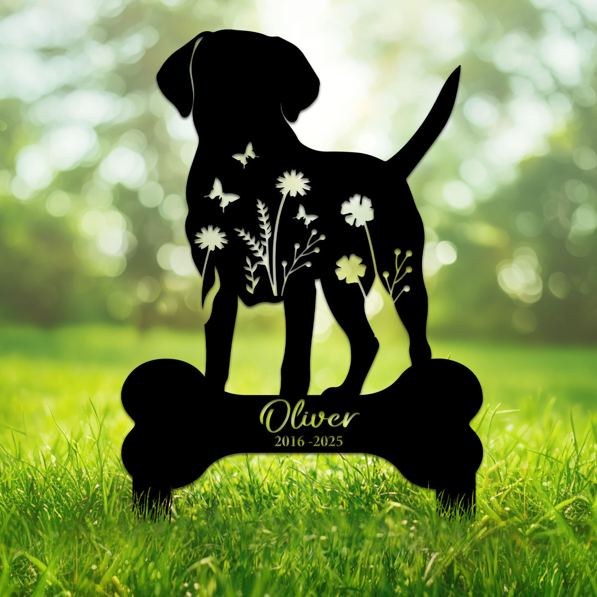 Labrador Retriever memorial metal sign with floral and butterfly silhouette in a garden setting