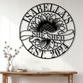 Sunflower She Shed wall sign styled on a light wood-paneled wall above a rustic console table