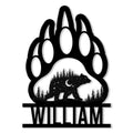 Custom bear metal sign featuring a large paw print, moonlit bear, and pine forest silhouette