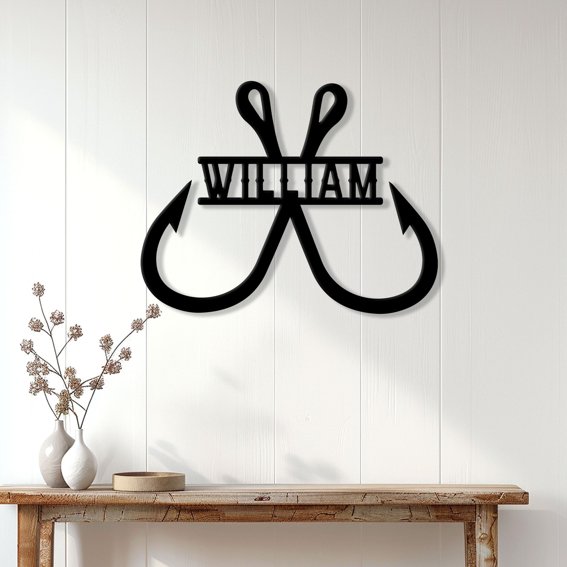 Custom fishing hook sign displayed on a white paneled wall above a rustic console table