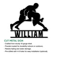 Cut metal wrestling sign feature guide showing the silhouetted wrestling design