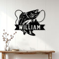 Custom fish wall sign displayed on a white paneled wall above a rustic console table