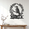 Woodpecker metal wall sign displayed on a light paneled wall above a rustic console table