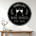 She Shed wine sign displayed on a white paneled wall above a wooden console