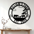 Cow farm metal wall sign displayed above a rustic console table in a bright farmhouse interior