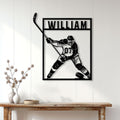 Hockey player metal wall sign displayed on a white paneled wall above a wood console table