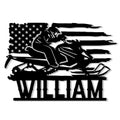 Black metal sign featuring a snowmobile rider over a stylized American flag design