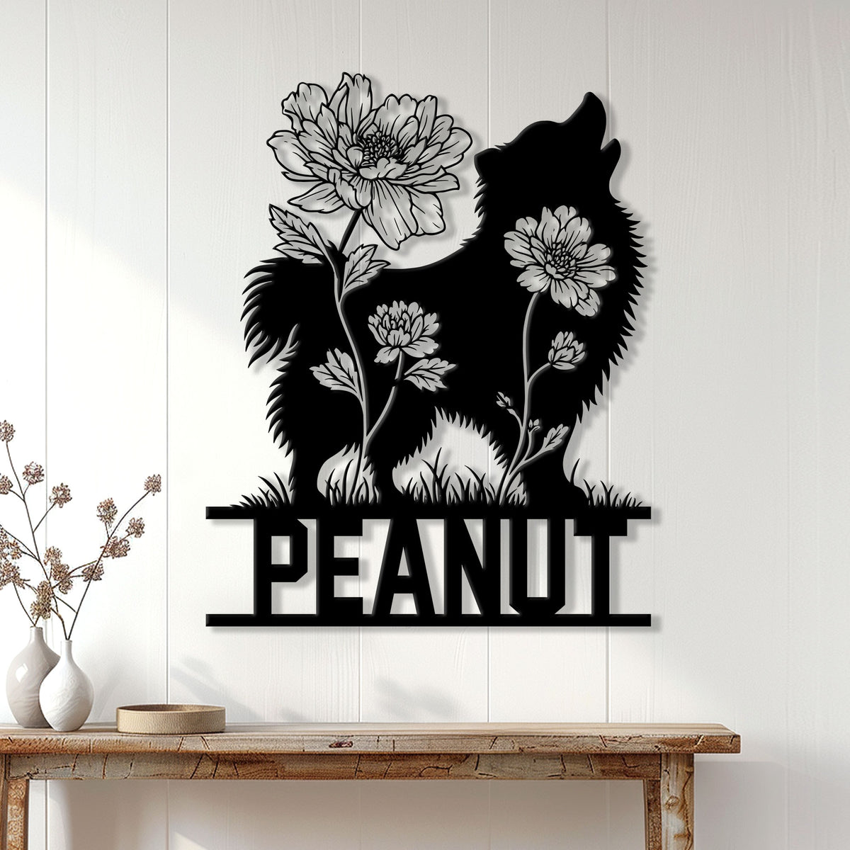Pomeranian floral silhouette metal sign displayed on a bright wall above a console table