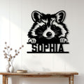 Custom raccoon wall sign displayed on a light paneled wall above a console table