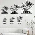 Bee honeycomb heart metal sign shown in multiple size options above a living room sofa