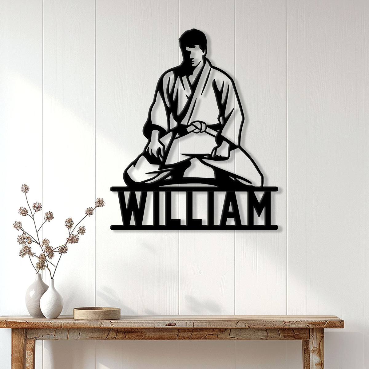 Jiu Jitsu metal wall sign displayed on a light paneled wall above a rustic console table