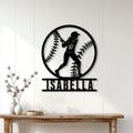 Softball wall sign displayed on a bright paneled wall above a console table