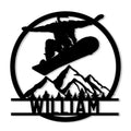 Snowboarding metal sign featuring a jumping snowboarder, mountain peaks, pine trees, and a circular silhouette