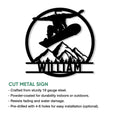 Snowboarding metal sign feature graphic showing a mountain rider design with cut metal construction details