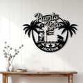 Puerto Rico wall decor displayed above a console table, featuring palm trees, lighthouse, flag, and coqui frog