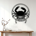 Crab metal wall decor displayed on a white paneled wall above a rustic console table