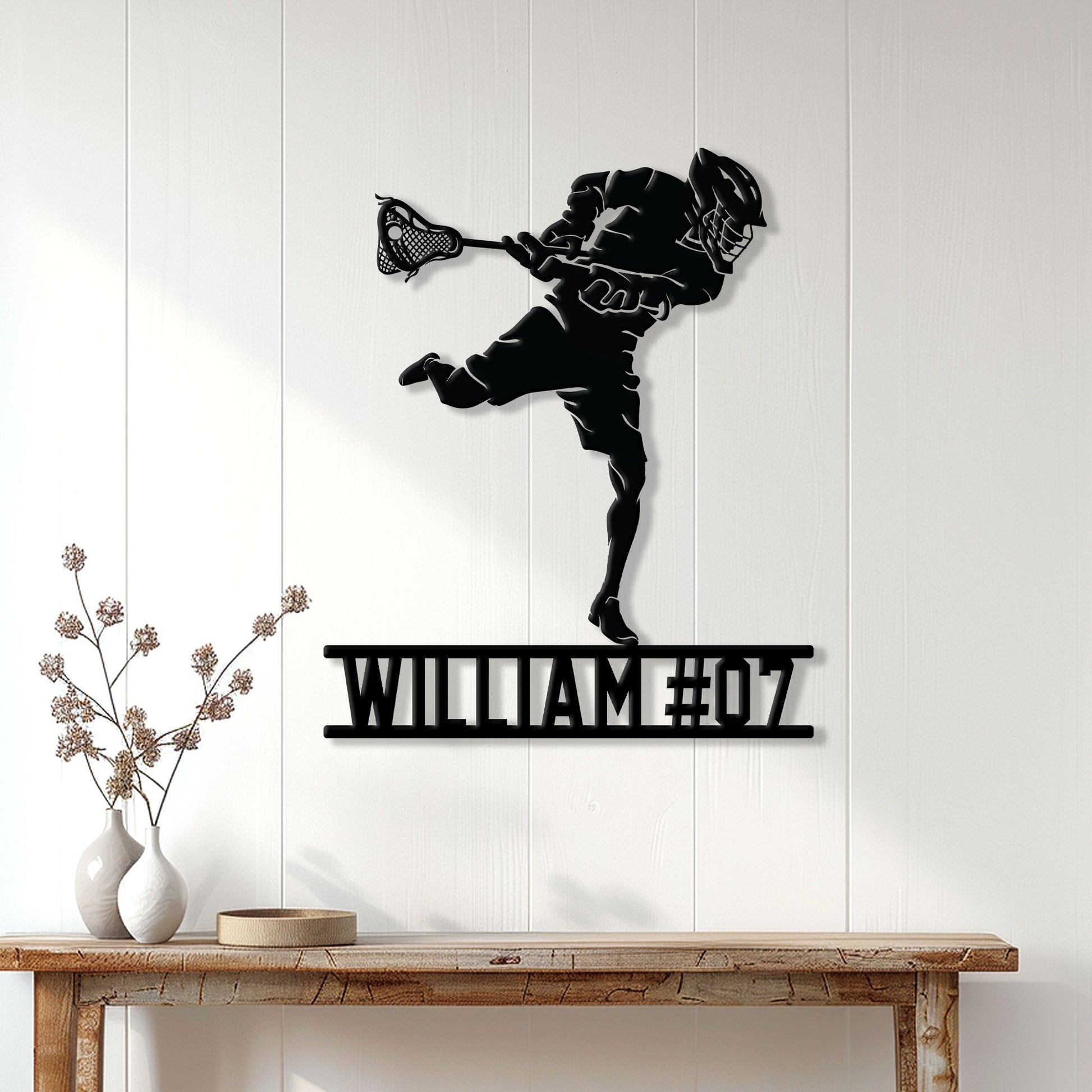 Lacrosse wall decor displayed on a white paneled wall above a console table