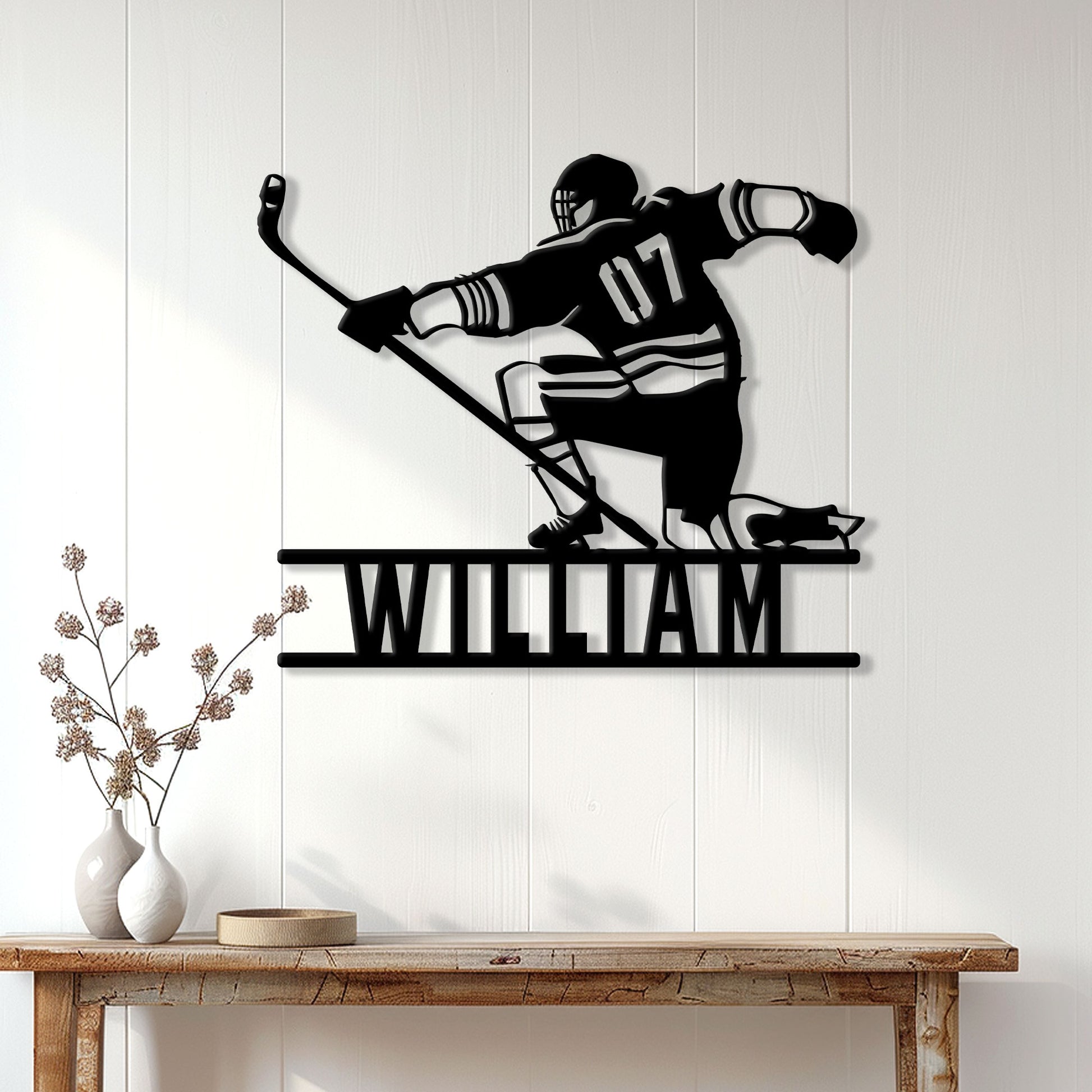 Hockey wall decor displayed above a console table in a bright modern living room
