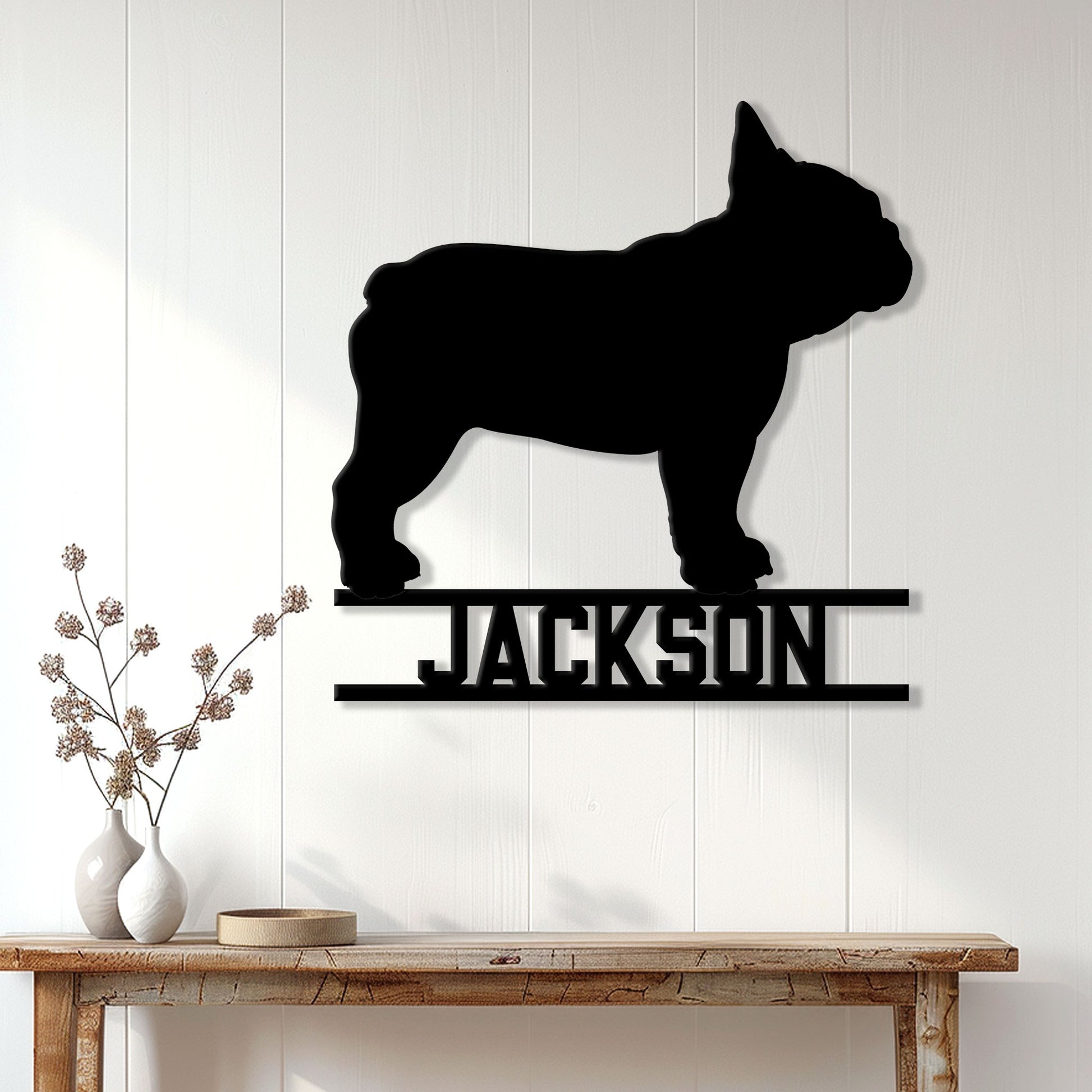 French Bulldog metal wall sign displayed on a light paneled wall above a console table