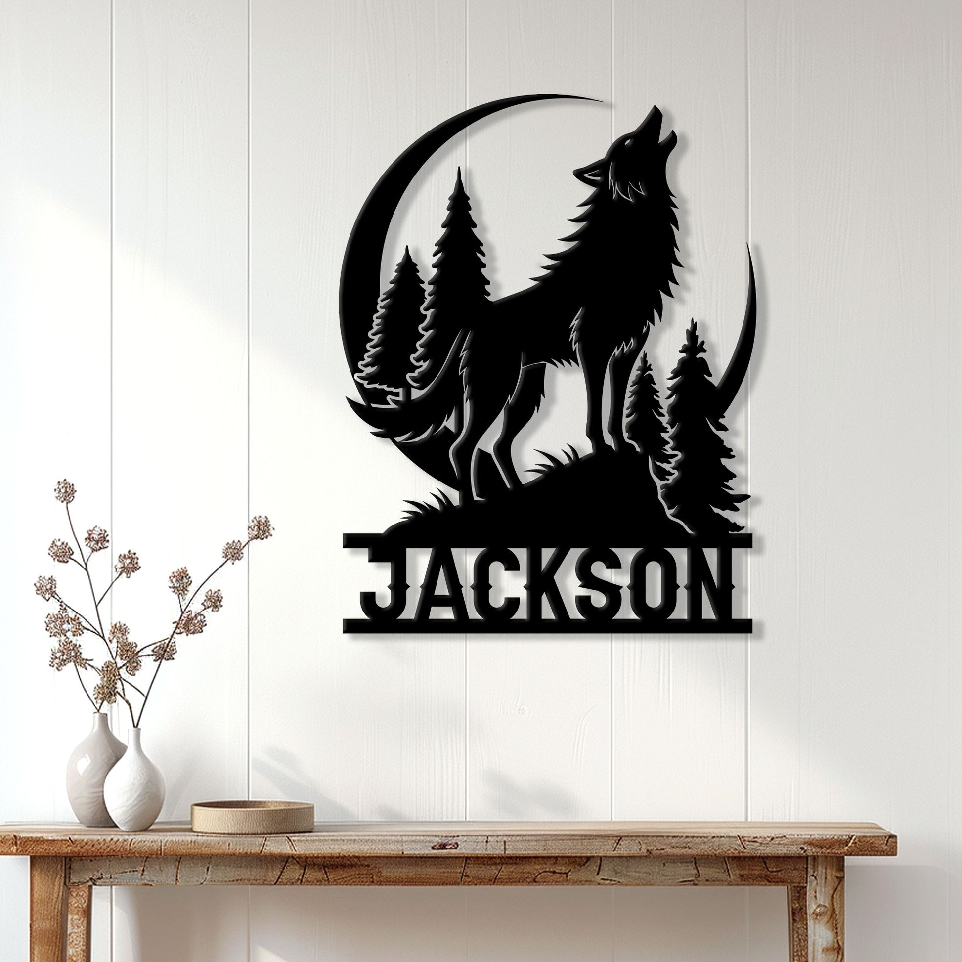Wolf silhouette metal wall sign displayed on a light wood-paneled wall