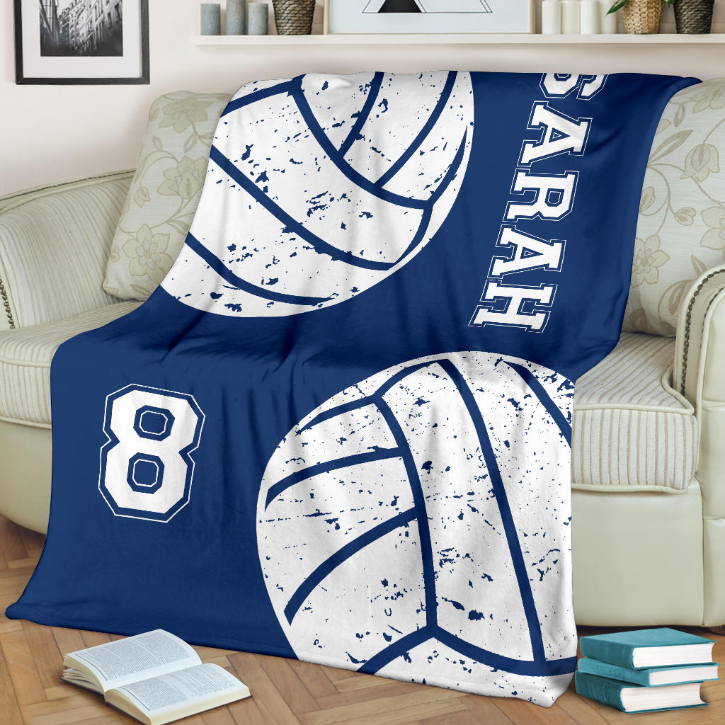 Custom volleyball blanket with navy blue and white distressed volleyball graphics, bold athletic lettering and jersey-style number design