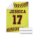 Softball blanket displayed flat with yellow and burgundy sports artwork and folded blanket detail
