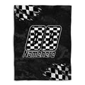 Black racing throw blanket with checkered flags, bold number artwork, and dark textured background