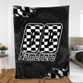 Black and white checkered flag racing blanket displayed in a modern bedroom