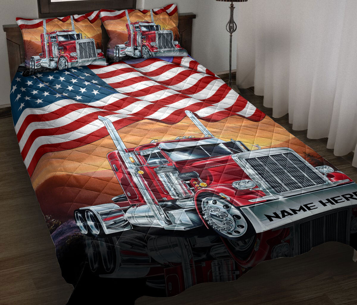 Red semi truck quilt blanket displayed on a bed with American flag artwork and patriotic colors
