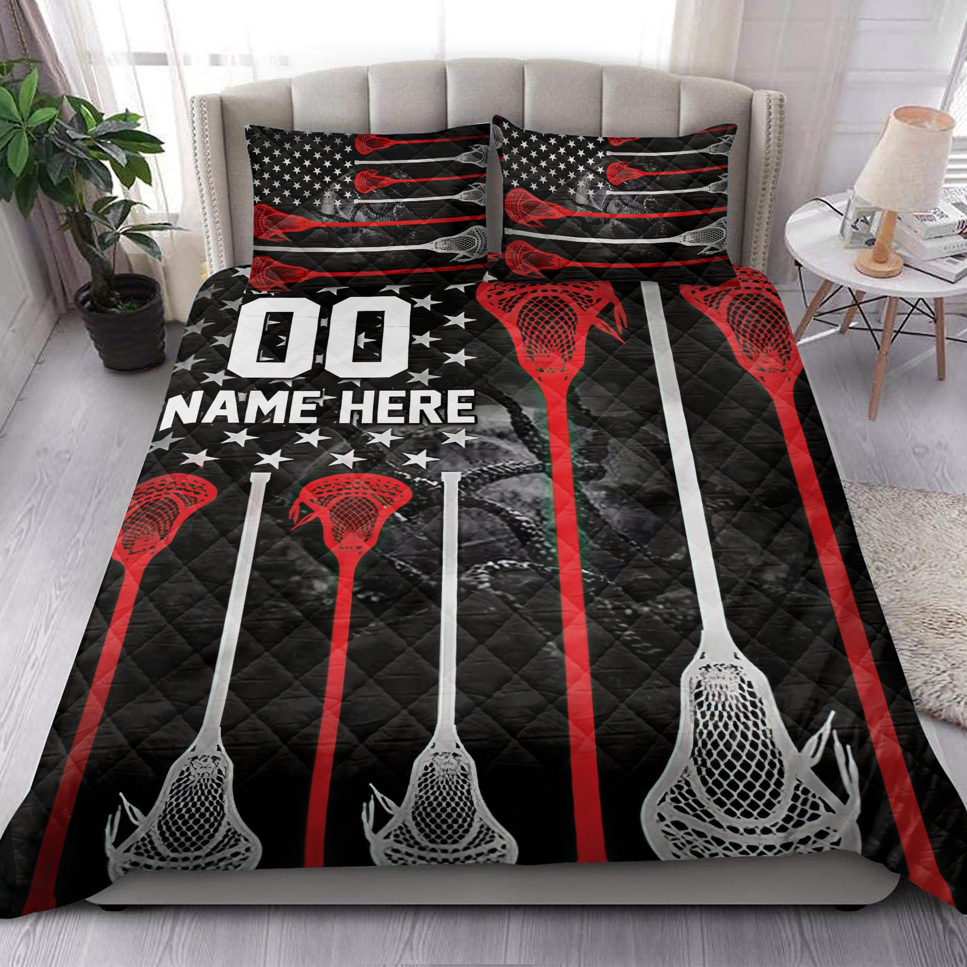 Lacrosse quilt blanket styled on a bedroom bed with repeating sticks and red, black, and white stripes