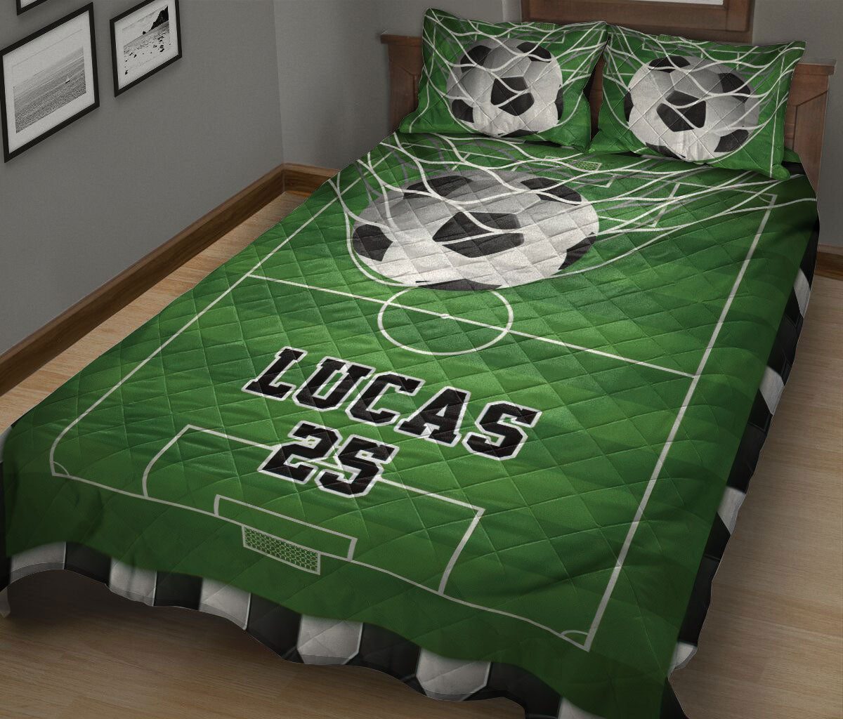 Green soccer quilt blanket on a bed featuring soccer balls, pitch lines, goal graphics, and bold sports artwork
