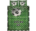 Front view of green soccer quilt bedding with soccer ball artwork, field markings, and coordinated bedroom design