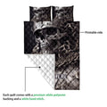 Skull quilt showing the printed front artwork and white quilted reverse backing
