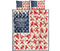 Motocross quilt blanket and bedding set shown flat with repeated dirt bike rider artwork and star panels